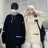 Мужские свитера мужские вязаные свитера. Пулверы женские дыры дизайн Harajuku Fashion Knitwear High Street Мужской осень -вязаный вязаный