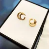 Femmes classiques d'oreille d'oreille Fashion Gold Eartrop Vintage Hollow Letter Boucles d'oreilles Party Party Bijoux avec boîte de boîte 2423