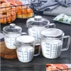 Outils de mesure 250 / 500Ml Outils de mesure Tasse en verre avec Er et Échelle Lait Résistant À La Chaleur Tasses Mesure Jug Creamer Échelles Thé Café Dhlc8