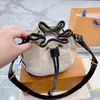 Embossed Bucket Bag Mini Shoulder Bags Top Designer Crossbody for Women Mini Handbag Fashion Cross Body Drawstring Handbags Flower Wallet