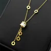 Collier de marque Femme chaîne avec des motifs floraux Fashion Women Necklace Gold