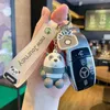 Keychains Cute Cartoon Sitting Bear Keychain Creative Car Bag Accessories Hanging Ring Personlig liten gåva T220909 T220909