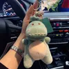 Porte-clés Dessin animé mignon jungle tyrannosaure poupée porte-clés en peluche petit dinosaure porte-clés enfant jouet cadeaux couple sac pendentif accessoires 13 cm T220909