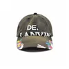 Top Hip Hop Graffiti Hat Lettering Casual Curved Brim Base Vintage Baseball Cap para homens e mulheres Splash Ink Letters Printing