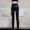 Pantaloni da donna con lettere di marea, collant neri sottili alla moda, leggings fitness a vita alta