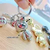 Keychains Wukong Metal Keychain hanger trend cartoon versie Monkey King Key Chains beweegbare metalen poppen sleutel hanger T220909