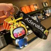 Keychains Fashion metal cartoon cute little yellow duck doll keychain creative small gift mobile phone backpack car pendant fun keychain T220909