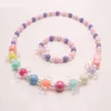 Mode coloré fleur/nœud papillon perles collier Bracelets à la main élastique enfants filles ensemble de bijoux pour cadeau de fête