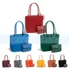 Mini compras de fim de semana Bolsas de luxo Bolsa de mão de couro genuíno bolsa transversal pochete Bolsas de mão dupla face Designers bagagem de viagem bolsa de ombro vagabundo para homens e mulheres