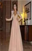 2016 Myriam Fares Champagne Pink Luxury Prom Dress a Line Sheer Tulle v Neck Bling Beaded Crystal Long Sleeve Evening Gowns2742399