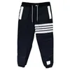 Thom Man Pant Fashion Brand Мужские зимние спортивные штаны Классические 4-барные полосы, заполненные ветроизрелькими, мужчина толстые темно-синие туберкулез
