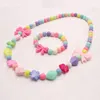 Mode coloré fleur/nœud papillon perles collier Bracelets à la main élastique enfants filles ensemble de bijoux pour cadeau de fête