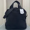 lu yoga sac à main femme humide étanche moyen bagage sac court voyage sac 19L de haute qualité avec logo de la marque LU-LW9CC1S