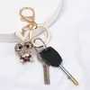 Anahtarlık 1 adet anahtarlık Anahtar zincir parlak rhinestone metal içi boş anahtar çanta el çantası dekor cazibe kolye takı hediyeleri için