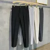 Pantaloni da uomo autunno inverno abito casual pantalone slim fit work elastico pantaloni da jogging maschio grigio nero più dimensioni 40 42 221116