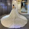 Abito da sposa con fiori 3D Arabia Saudita Abiti da sposa sexy a maniche lunghe con scollo a V trasparenti Abito da sposa romantico Robe De Mariee