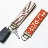 Keychains Fashion 5pcs/6pcs/7pcs Cloth Print Key Ring Belt Holder Wrist Keychain Hanger Buckle Hook Outdoor Tools