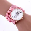 Montres-bracelets 100pcs / lot boîtier en or Dream Chaser aucun logo montre en cristal mode quatre fleurs pleine enveloppe quartz en gros montre-bracelet