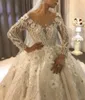 Abito da sposa con fiori 3D Arabia Saudita Abiti da sposa sexy a maniche lunghe con scollo a V trasparenti Abito da sposa romantico Robe De Mariee