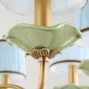シャンデリアモダンな本物のブロンズ銅シャンデリアベッドルームダイニングリビングルームロータスフラワースタイルとセラミックの豪華なホーム照明