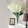 장식용 꽃 10pcs 4colors 인공 실크 가짜 싱글 젖소 꽃 DIY 웨딩 홈 Cymbidium Orchid