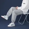 Herenbroeken Koreaanse stijl Fashion Sweatpants herfst Lichtgrijze flodderige wijzige brede poot rechte poot Casual Tie voeten broek mannelijk 221117