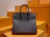 Sac kellyity Birkinbag sacs Ari à la main Handmade haut de gamme BK25 Togo en cuir en cuir gris 25 Gold Buckle Wax Filet