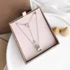 Collier en acier inoxydable Pendant les dames luxe Nouveau pendentif créatif creux de printemps avec plein de diamants glacés sur les deux côtés Classic 3381596