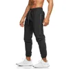 Pantalons pour hommes Salopette multi-poches pour hommes Sports d'automne et d'hiver Casual Tide Marque Entraînement de course en plein air Pantalon de fitness M-3XL