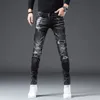 Jeans da uomo versione coreana Mens nero strappato elegante slim stretch leggero lusso splash inchiostro stampa sexy street 221118