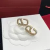 Diseñador de lujo Pendientes de joyería para mujer Trajes de fiesta formales Vestido Diseñador de moda Anillo de oreja para mujer Joyas premium Mujeres V Letras8988658