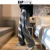 Pantaloni da uomo KAPMENTS Salopette da uomo Gambe larghe Streetwear Baggy Spring Mens Pantaloni sportivi neri Harajuku Pantaloni da jogging Harem casual maschili 5XL 221117