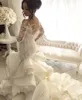 Ruffles arabiska underbara Dubai sjöjungfrun bröllopsklänningar för brud med långa ärmar ren nack spets brudklänningar kapell tåg smal och flare vestidos de novia