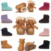 Zapatos para niños uggi Botas cálidas australianas Niños pequeños mini bota de nieve con lazos Zapato con lazo para niñas Zapatillas de deporte para niños Calzado de cuero diseñador chivato 65mc #
