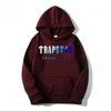 Sweats à capuche pour hommes Sweats TRAPSTAR Survêtement Marque Imprimé Sportswear Hommes 18 Couleurs Chaudes Deux Pièces Ensemble Lâche Sweat Pantalon Jogging 221117