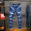 Calças de brim dos homens novos moda jeans magros homens em linha reta magro elástico calça dos homens casual motociclista masculino estiramento denim calças calças clássicas