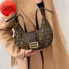 Il negozio ha l'80% di sconto all'ingrosso Borsa di marca femminile 2023 New Fashion French Stick Ascella Spalla Net Red Air Canvas Messenger