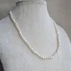 100ナチュラルパールジュエリーホワイトカラー56mmフラワーガール淡水真珠のネックレスウェディングバースデーパーティーギフト284o3969149