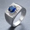 Bröllopsringar klassiska fyra stans runda stenblå/vit zirkon för män vintage mode smycken manlig silverfärgförlovningsring