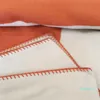 Cobertores de designer Carta Cashmere Lã de lã macio Shawl portátil sofá -cama de lã de lã de malha portátil.