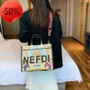 상점은 80% 할인 도매 Fenjia 인쇄 낙서 대용량 휴대용 토트 백 여성 2023 New Fashion One Shoulder Messenger