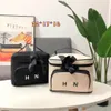 Sacolas de bolsas de designers de luxo na bolsa de compras go cruza bola de bolsa de compras de crossbody Flores Floral carteira Bolsas femininas Bolsas de lona cosm￩tica