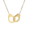 Beliebtes Edelstahl Geometrisch hohles Ausgangsmuster Handschellen Anhänger Gold und Stahl Farbe Unisex Halskette Schmuck290y
