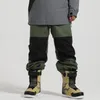 Ski -broek Dames Ski Pant Winter Snowboard broek Men Winddicht waterdichte paar Outdoor Sport Slijt