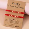 Creative Lucky 7 Knot Gold Beads Red Rope Woven Friendship Amistad Pareja Set de 2 piezas
