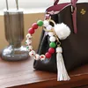 S3339 Silicone Beaded Christmas Key Chain PU Leather Tassel Plush Ball Tree Santa Claus Wrist Bracelet Keychain Key Rings