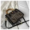 I negozi di fabbrica hanno uno sconto del 95% sulle vendite di liquidazione Borsa Donna 2023 Autunno Nuova borsa Moda Stampa Ricamo Industria Bamboo Knot Handheld One Shoulder Crossbody