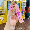 Keychains Creative Candy Drifting Bottle Into the Oil Girl Keychain Cute Student Men Women Bag Car Pene Par Festival Gift Keyring T220909