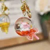 Keychains Creative Cartoon Acrylic Quicksand Unicorn Bag Ornaments Keychain Cute Oily Lollipop Cinnamon Dog Floating Liquid Keyring Gifts T220909