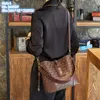 Wholesale factory ladies shoulder bags 3 colors everyday Joker printed backpack elegant letter bucket bag three-layer barrier contrast leather handbag